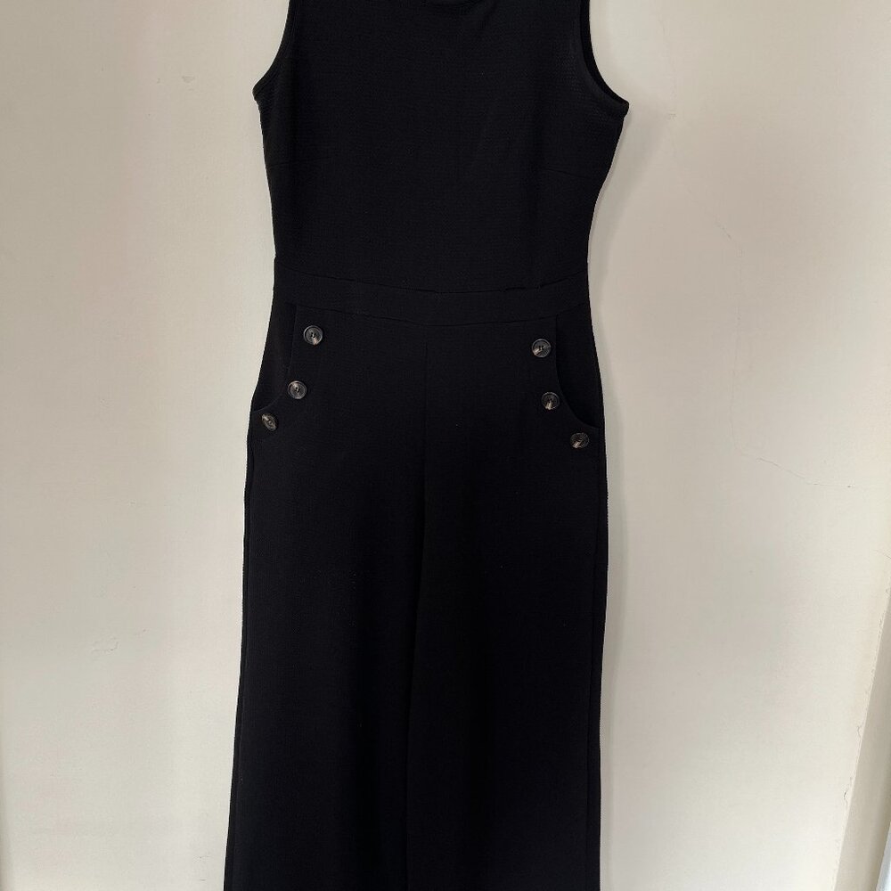Black cotton sleeveless jumpsuit with pockets